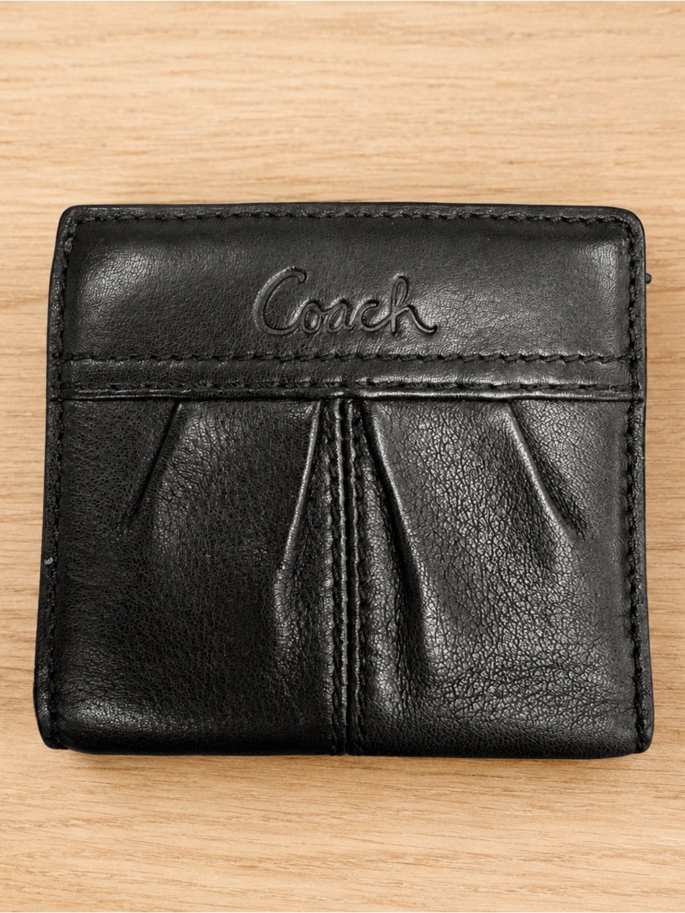 Coach Black Leather Compact Wallet with Embossed Logo